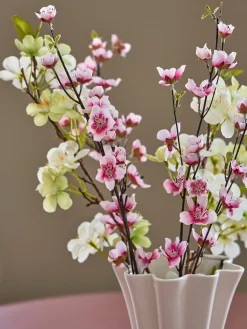 Branche fleurie artificielle