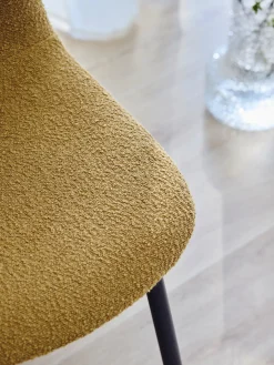 Fauteuil en tissu bouclé