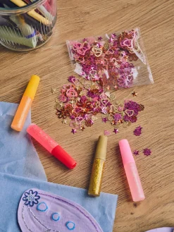 Paillettes et colle pailletée